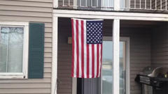 Landlords tell residents to take down American flag
